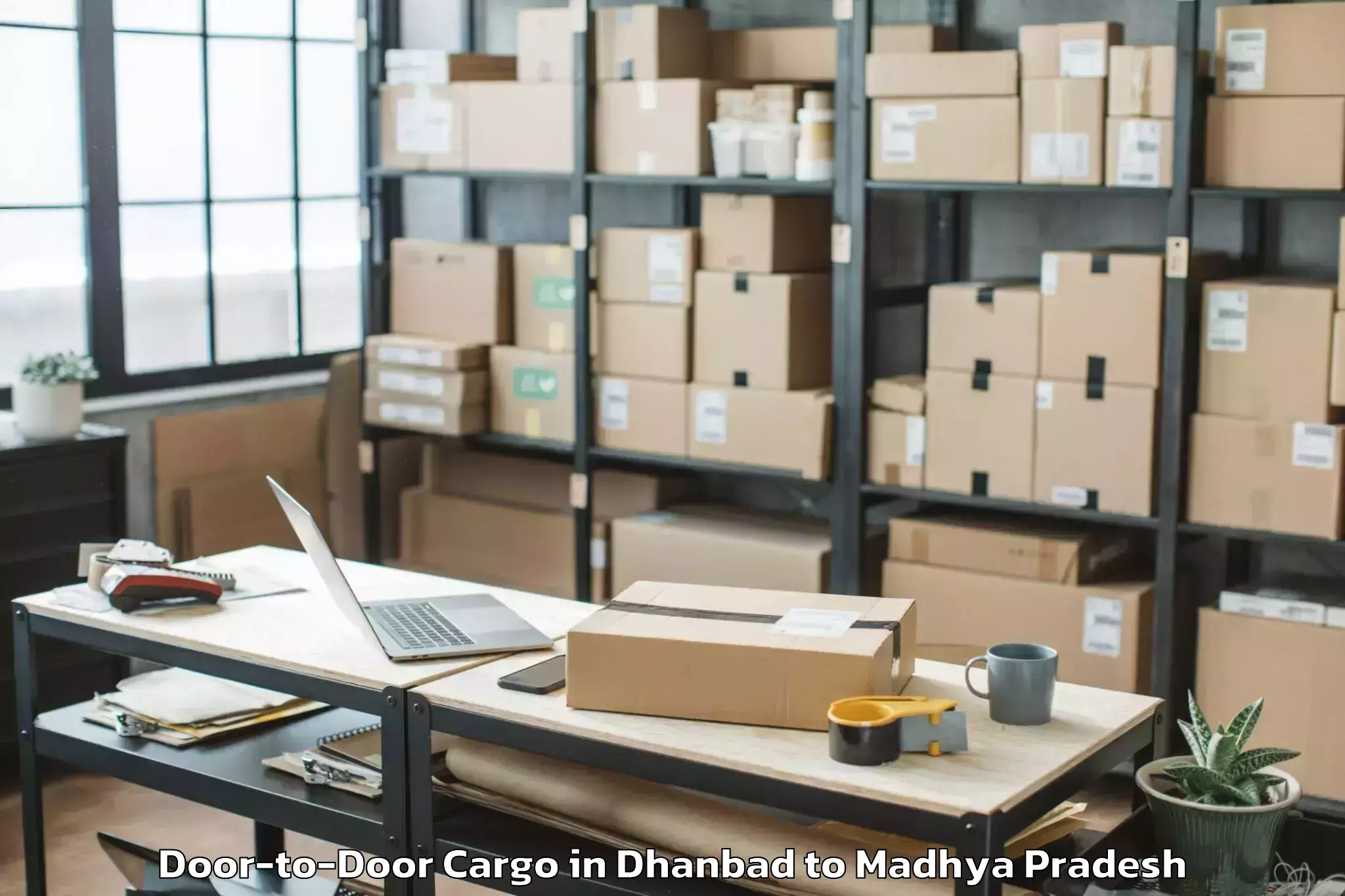 Get Dhanbad to Badarwas Door To Door Cargo